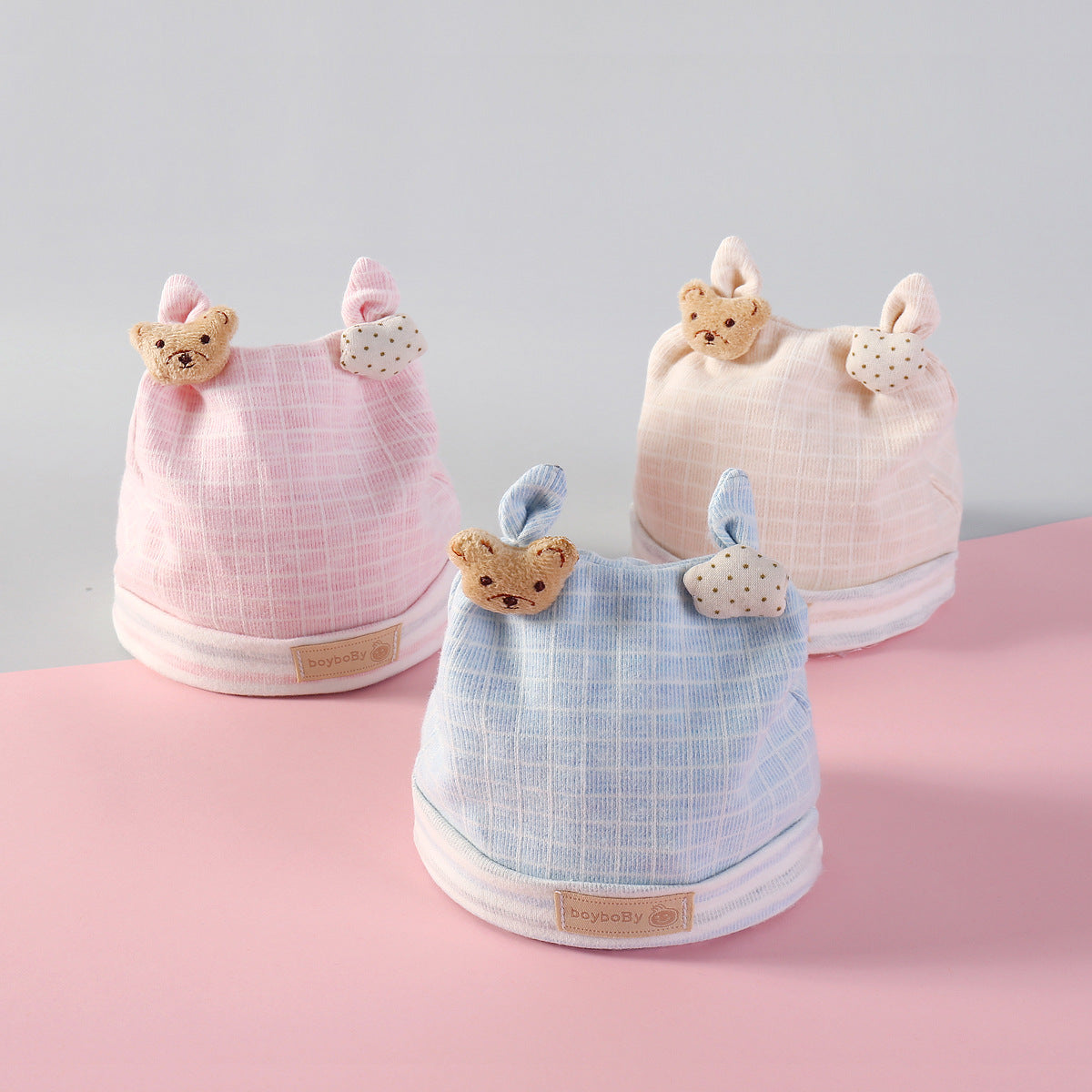 Baby Mütze für Mädchen und Jungen mit schicken Knoten